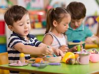 Children play with clay