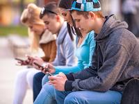 Young people with smartphones