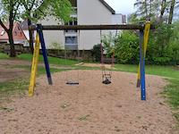 Double swing with toddler swing