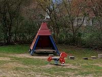 Playhouse and seesaw animal