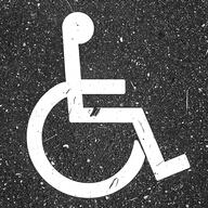 Rollstuhlsymbol auf Asphalt