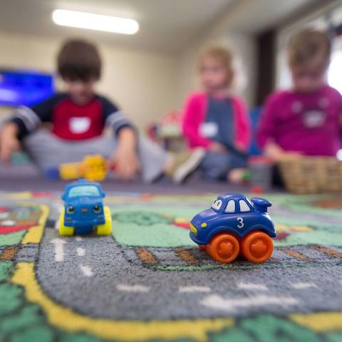 A play mat with toy cars