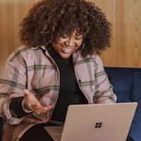 Woman sitting at her laptop.