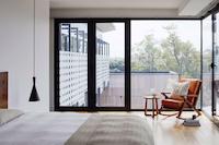 Empty apartment with large window.